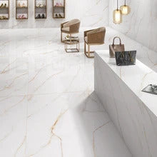 Luxury Calacatta marble tiles on a boutique floor